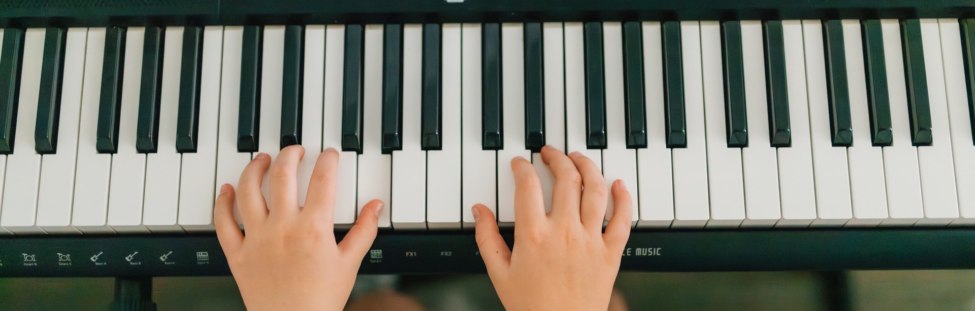 Hands on piano
